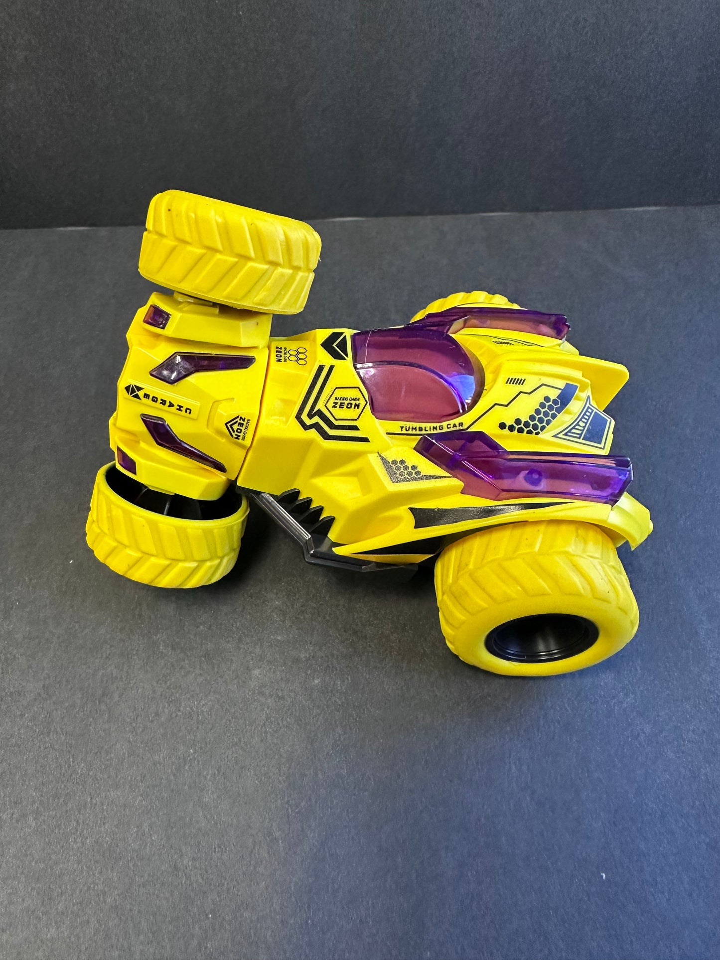 Friction Stunt Cars with 360 Rotating Front Wheels - 4 Differently Colored Hand Held Push-Powered Stunt Cars