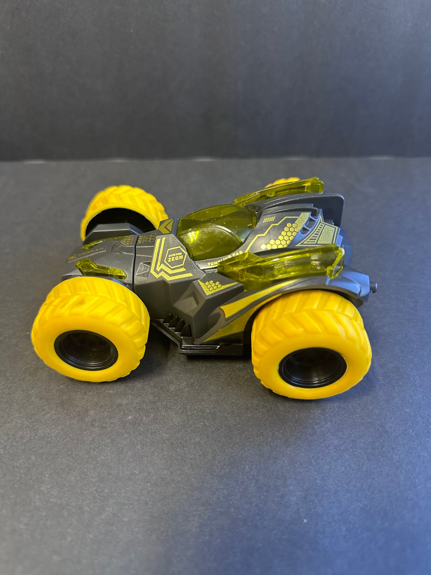 Friction Stunt Cars with 360 Rotating Front Wheels - 4 Differently Colored Hand Held Push-Powered Stunt Cars