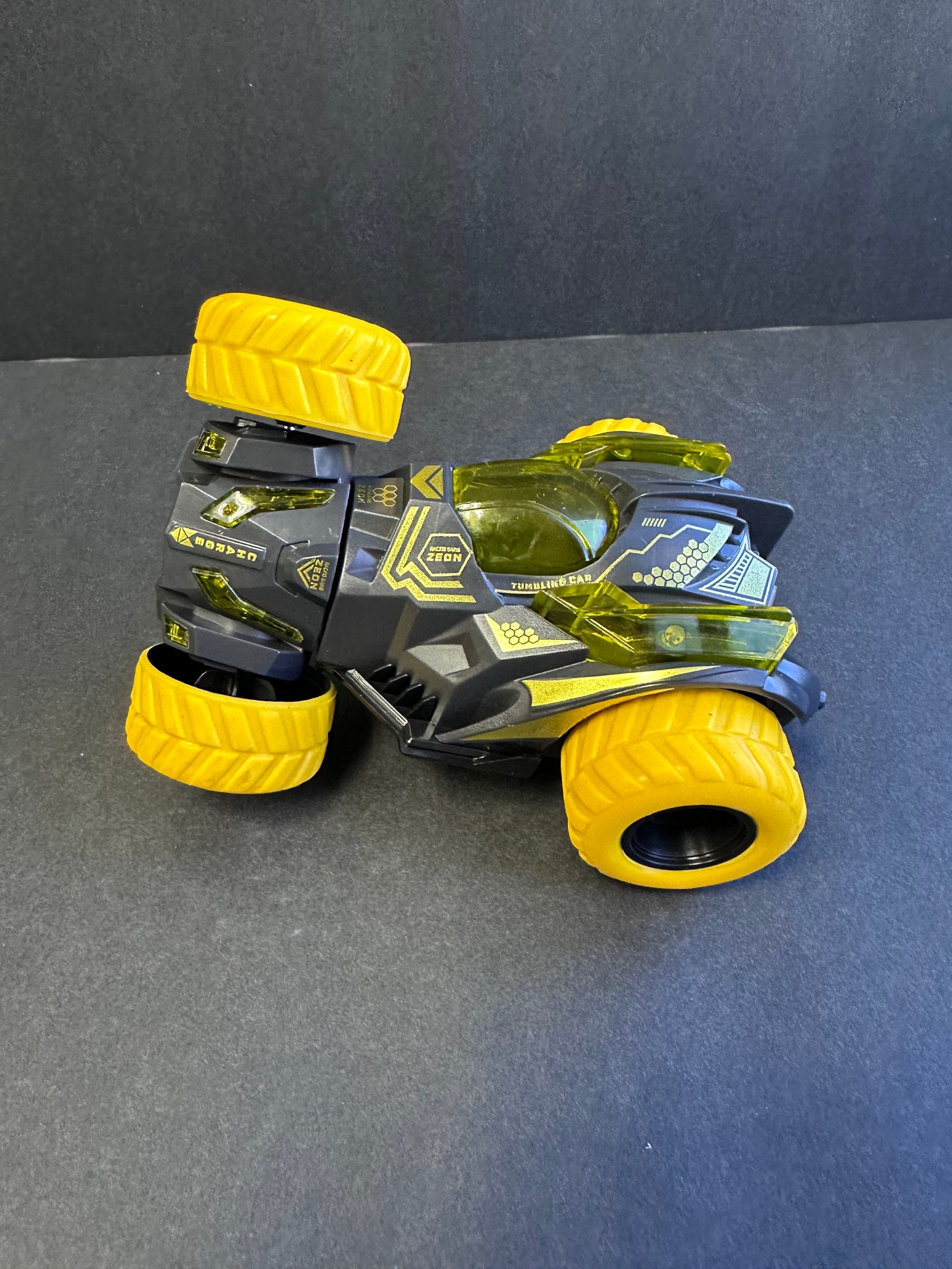 Friction Stunt Cars with 360 Rotating Front Wheels - 4 Differently Colored Hand Held Push-Powered Stunt Cars